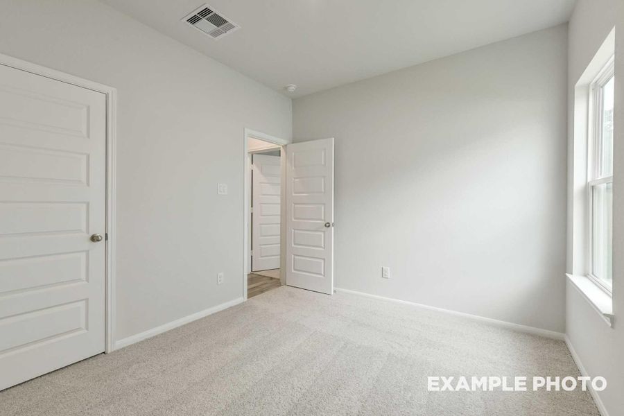 Spacious, unfurnished interior of a new home in Caney Creek Place, Conroe (Image 14). Spacious, unfurnished interior of a new home in Caney Creek Place, Conroe (Image 14).