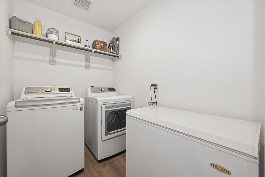 Utility room with storage shelf. Utility room with storage shelf.