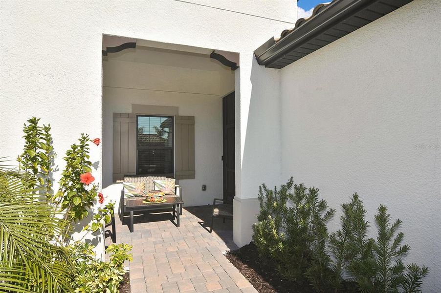 Exterior details and patio area of a home in , Englewood (Image 3).