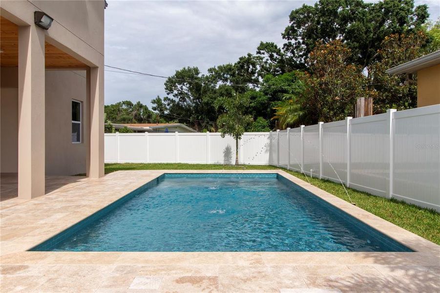 Exterior details and patio area of a home in , Tampa (Image 56).