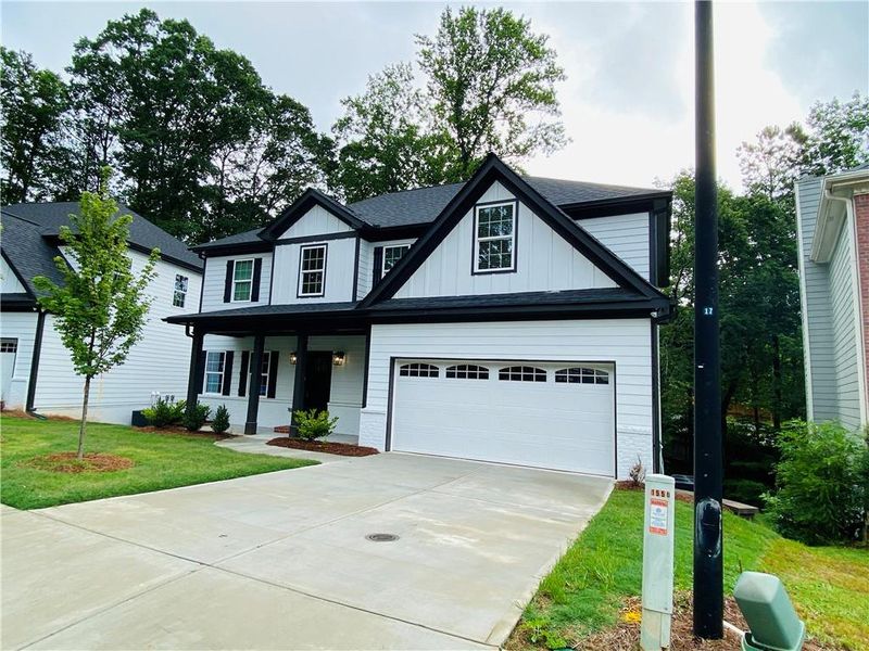 Front exterior of a new home in , Lawrenceville, GA, highlighting curb appeal (Image 25).