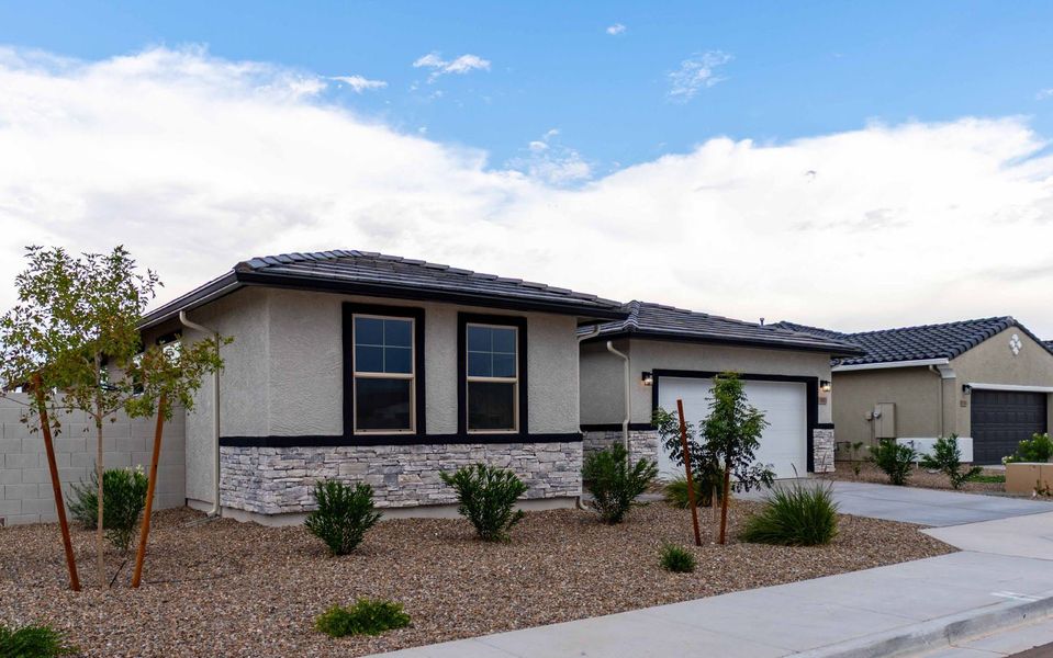 Front exterior of a new home in Rancho Mirage, Maricopa, AZ, highlighting curb appeal (Image 4).