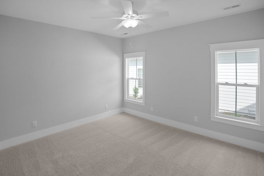 Spacious, unfurnished interior of a new home in Osprey Landing, Southport (Image 21).
