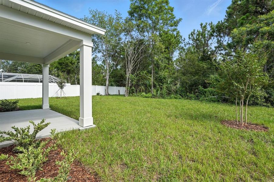 Front exterior of a new home in Palm Coast Homes, Palm Coast, FL, highlighting curb appeal (Image 2).