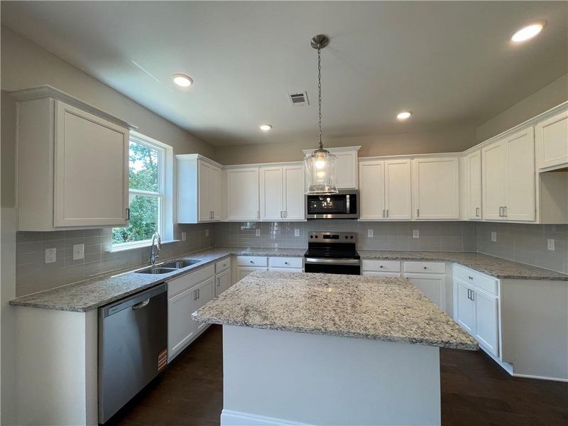 Furnished interior view inside a new home in Edenglen, Buford (Image 5).