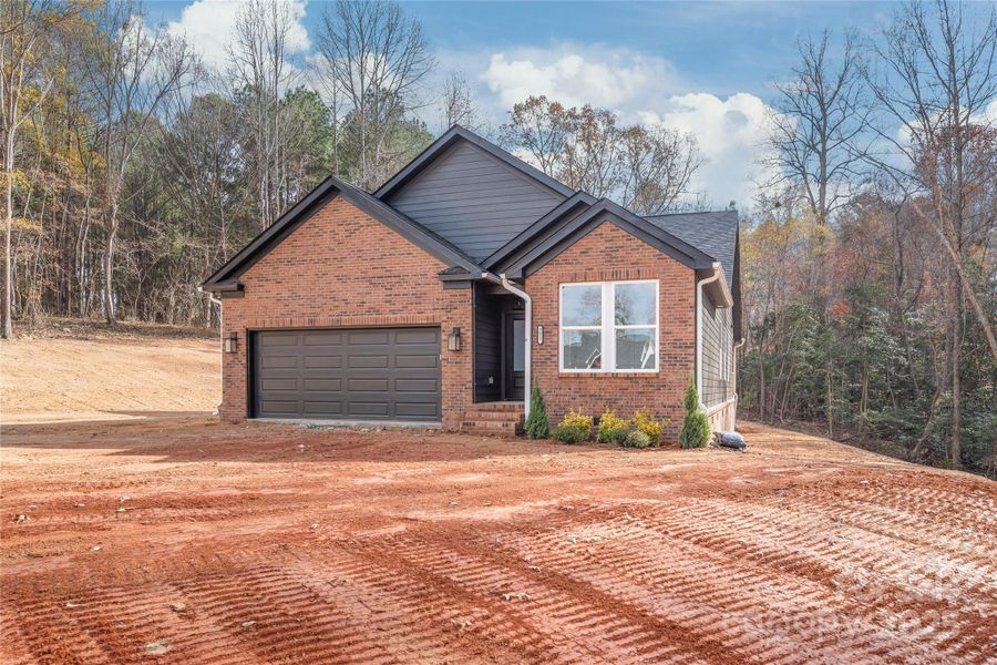 Front exterior of a new home in , Lincolnton, NC, highlighting curb appeal (Image 2). Front exterior of a new home in , Lincolnton, NC, highlighting curb appeal (Image 2).