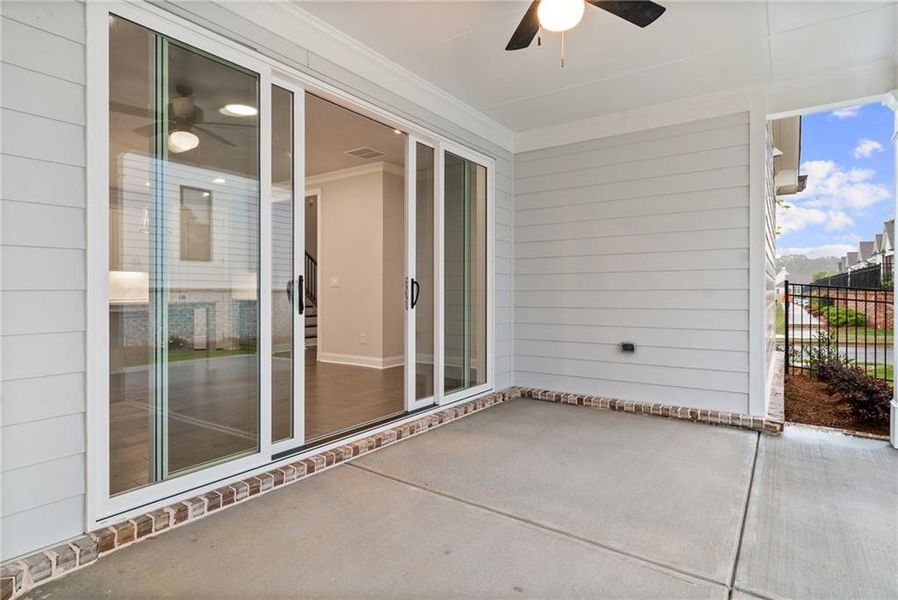 Exterior details and patio area of a home in Promenade at Sawnee Village, Cumming (Image 4).