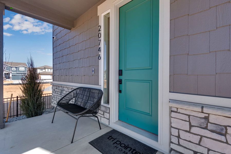 Representative exterior details of a home built from the 2803 by Tri Pointe Homes in Painted Prairie, Aurora (Image 27).