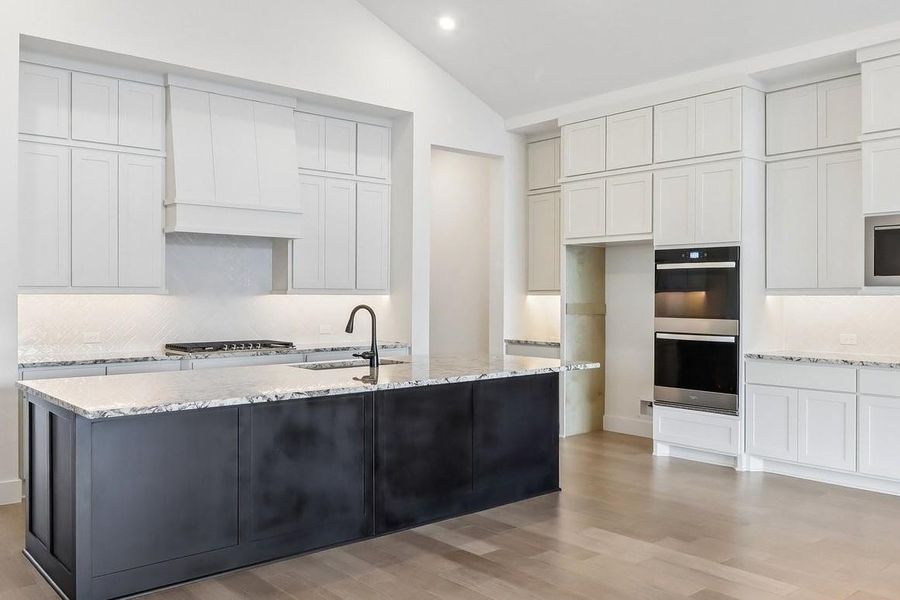 Furnished interior view inside a new home in The Grand Prairie 60', Hockley (Image 10).