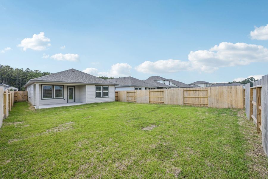 Front exterior of a new home in Landing Meadows - Traditional Series, New Caney, TX, highlighting curb appeal (Image 17). Front exterior of a new home in Landing Meadows - Traditional Series, New Caney, TX, highlighting curb appeal (Image 17).