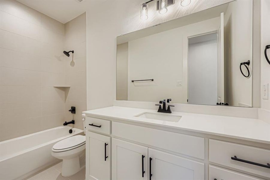 Furnished interior view inside a new home in M3 Ranch 60s, Mansfield (Image 11).