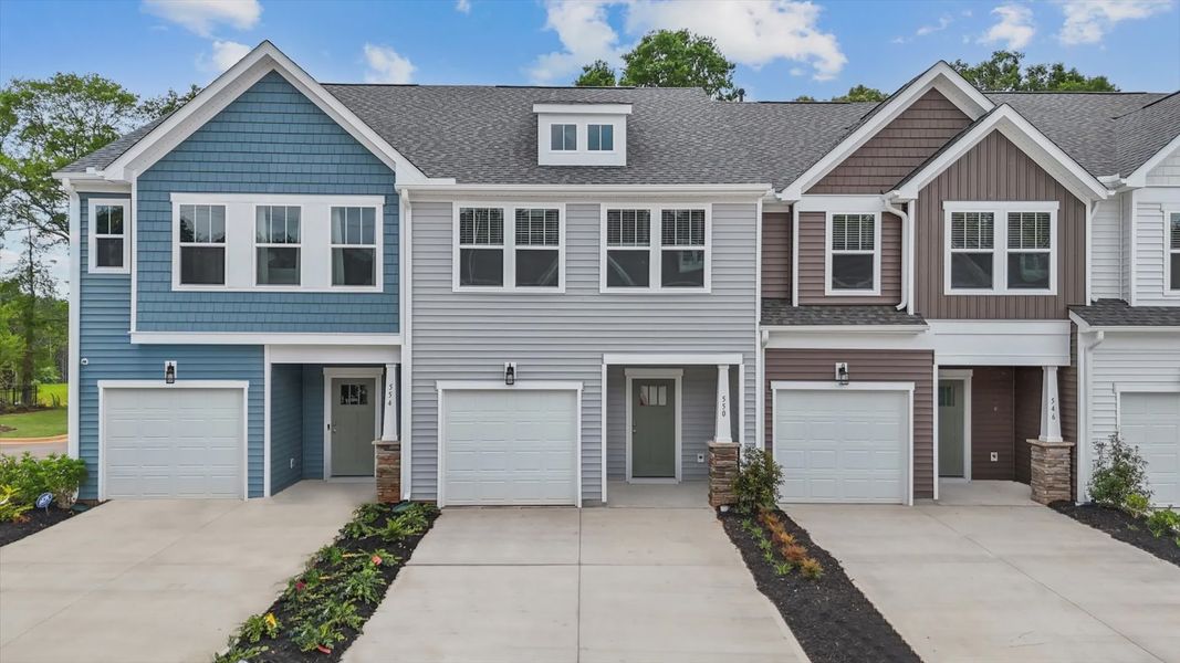 Two story townhome with large windows at Ransdell Pointe by DRB Homes in Spartanburg, SC