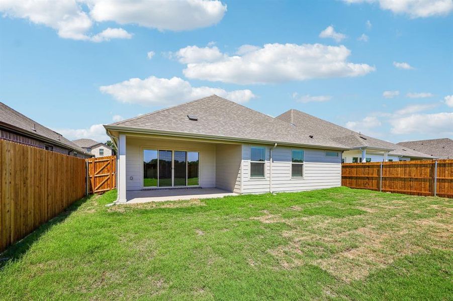 Exterior details and patio area of a home in Stella Hills, Denton (Image 4).
