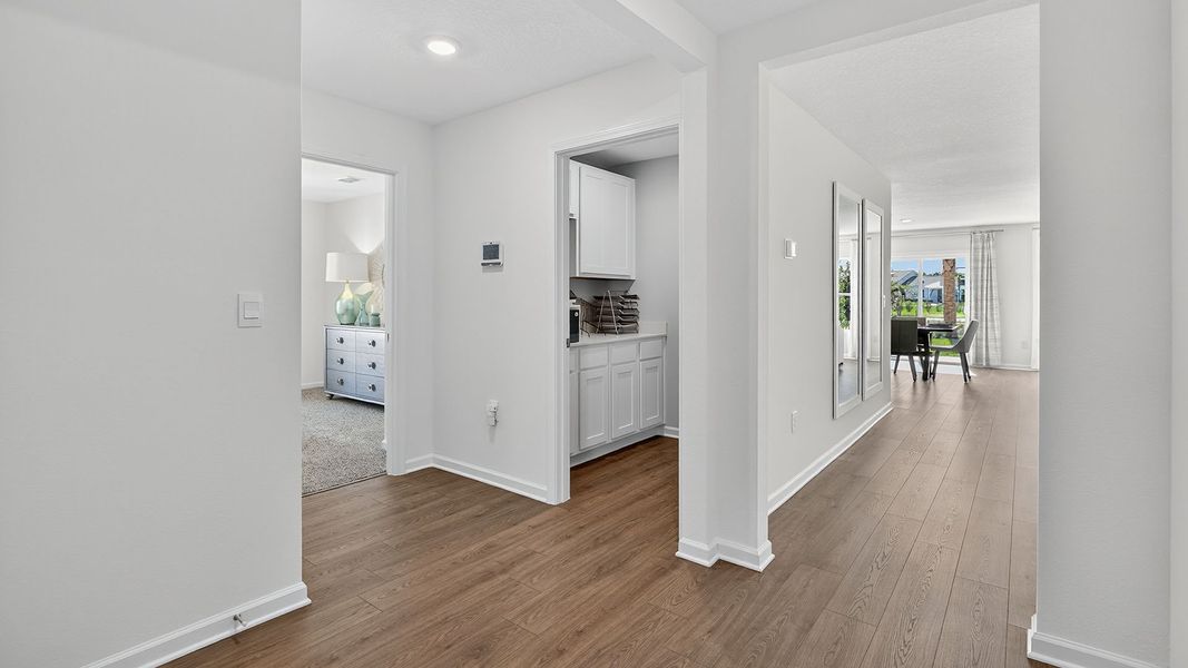Representative unfurnished interior of a home built from the CALI by D.R. Horton in Sawmill Branch Express, Palm Coast (Image 22).
