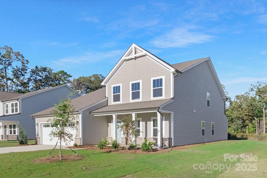 Front exterior of a new home in , Monroe, NC, highlighting curb appeal (Image 2). Front exterior of a new home in , Monroe, NC, highlighting curb appeal (Image 2).