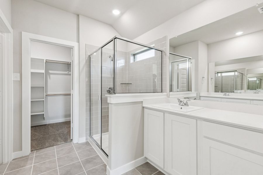 Primary Bathroom in the Heisman home plan by Trophy Signature Homes – REPRESENTATIVE PHOTO Primary Bathroom in the Heisman home plan by Trophy Signature Homes – REPRESENTATIVE PHOTO