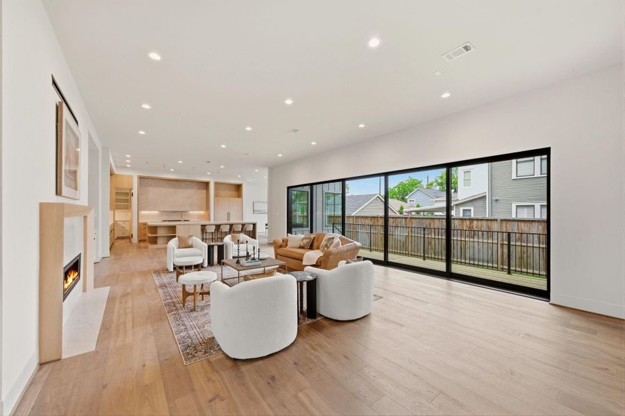 Multi-slider door provides light and bright atmosphere and indoor/outdoor ambiance.