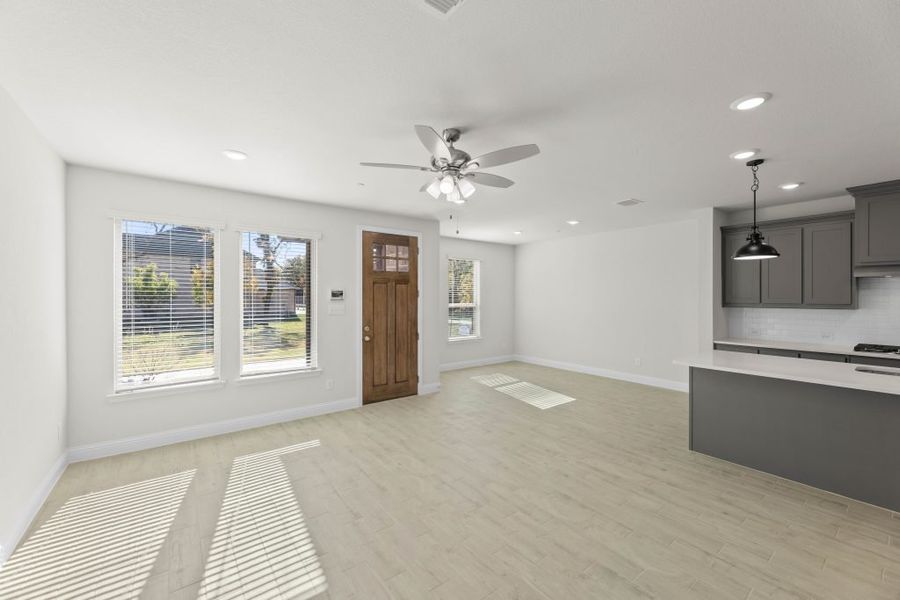 Representative exterior photo of a completed home built from the Whitney by Impression Homes in Timber Ridge, Corinth, TX (Image 10).