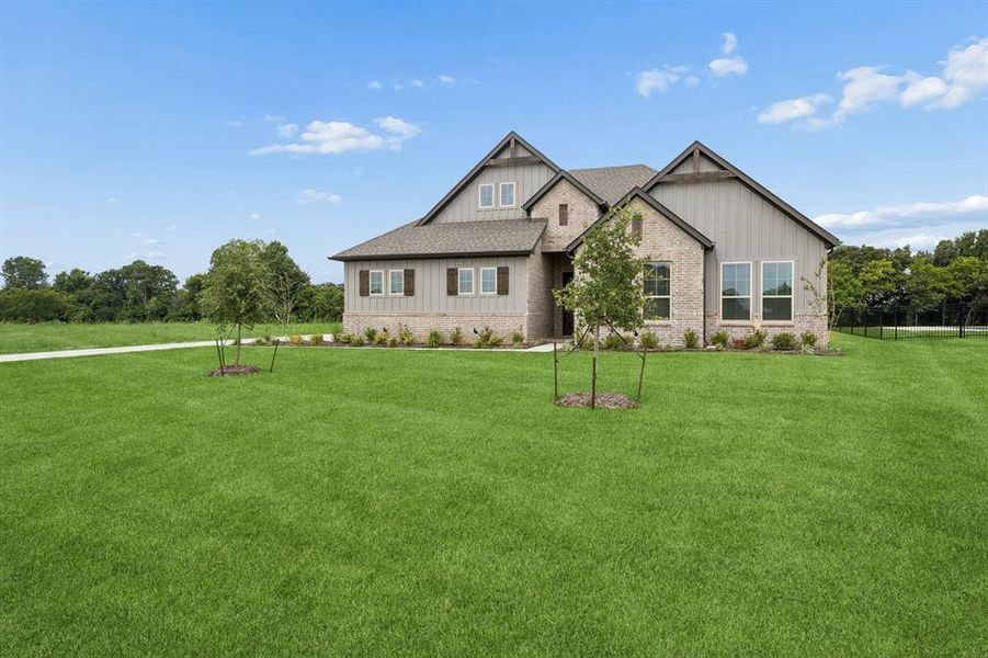 Front exterior of a new home in Joshua Meadows, Joshua, TX, highlighting curb appeal (Image 19). Front exterior of a new home in Joshua Meadows, Joshua, TX, highlighting curb appeal (Image 19).