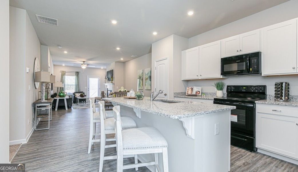 Furnished interior view inside a new home in The Cottages of Silvertown, Thomaston (Image 13).