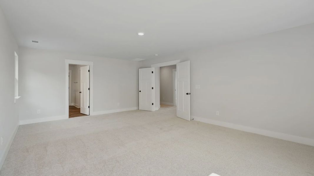 Representative furnished interior of a home built from the Stonefield - Finished Basement by DRB Homes in Pinebrook, Woodruff (Image 23).