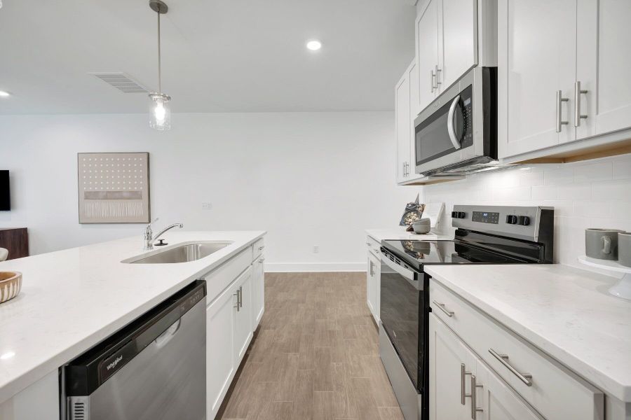 Representative furnished interior of a home built from the Aurora by Mattamy Homes in Ashmore Townes, Garner (Image 7).