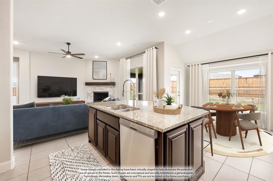 Open-concept kitchen with granite island and sink, flowing into living and dining areas with tile floors and backyard views. Open-concept kitchen with granite island and sink, flowing into living and dining areas with tile floors and backyard views.