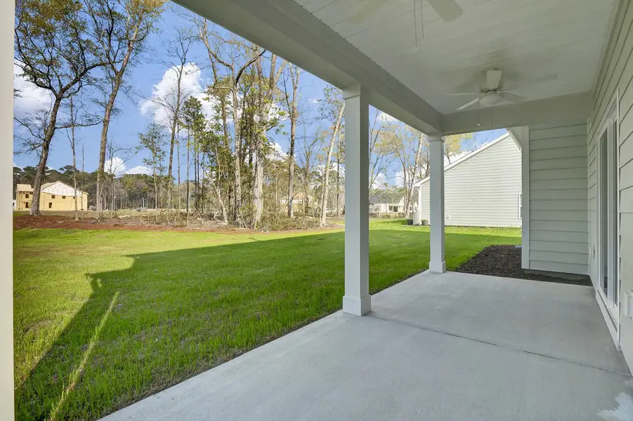 Exterior details and patio area of a home in Indigo at Abbey Preserve, Wilmington (Image 3).