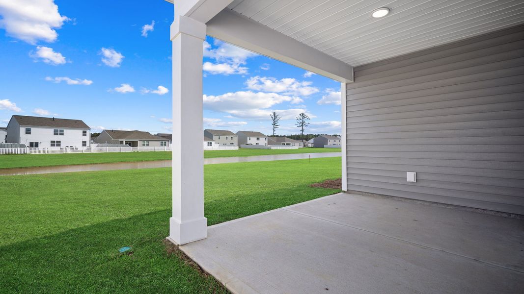 Exterior details and patio area of a home in The Retreat at East Argent, Ridgeland (Image 21).
