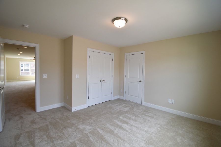 Representative unfurnished interior of a home built from the Cosmopolitan by Keystone Homes NC in Weybridge, Burlington (Image 29).