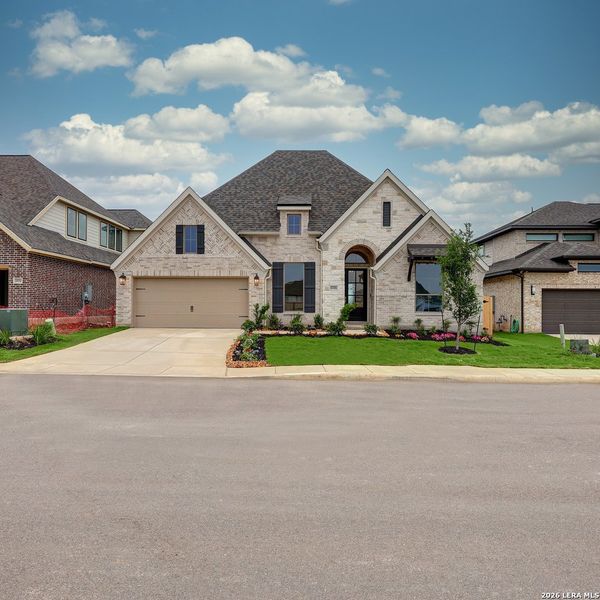 Front exterior of a new home in Kallison Ranch, San Antonio, TX, highlighting curb appeal (Image 2).