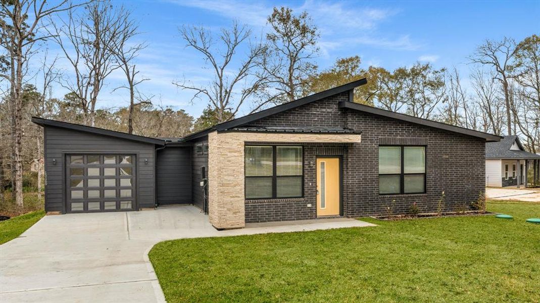 Front exterior of a home in the Frontier Lakes community, located in Willis, TX (Image 3). Front exterior of a home in the Frontier Lakes community, located in Willis, TX (Image 3).