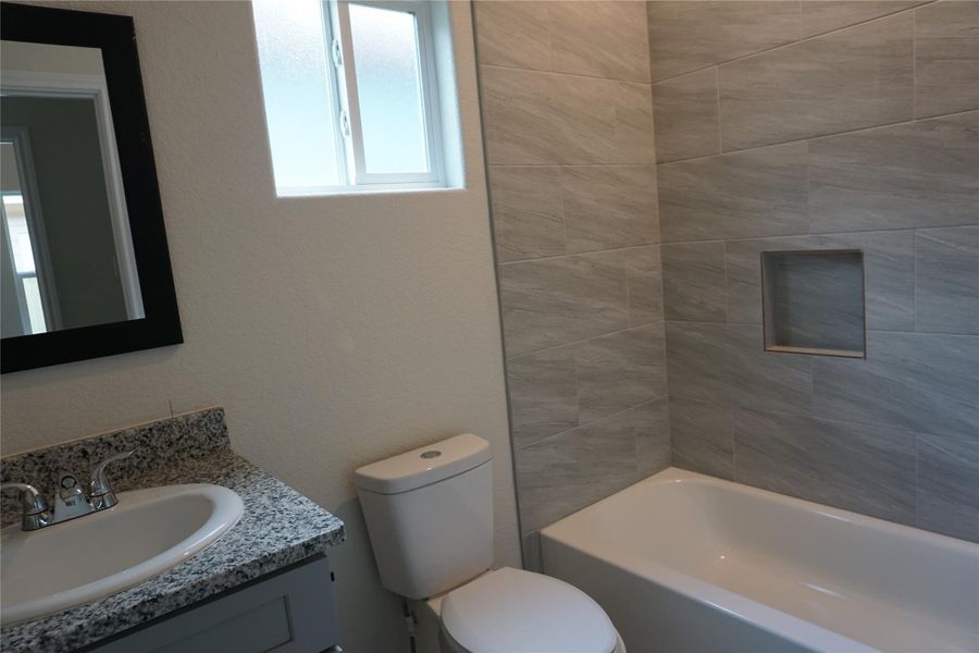 Furnished interior view inside a new home in , Willis (Image 3).