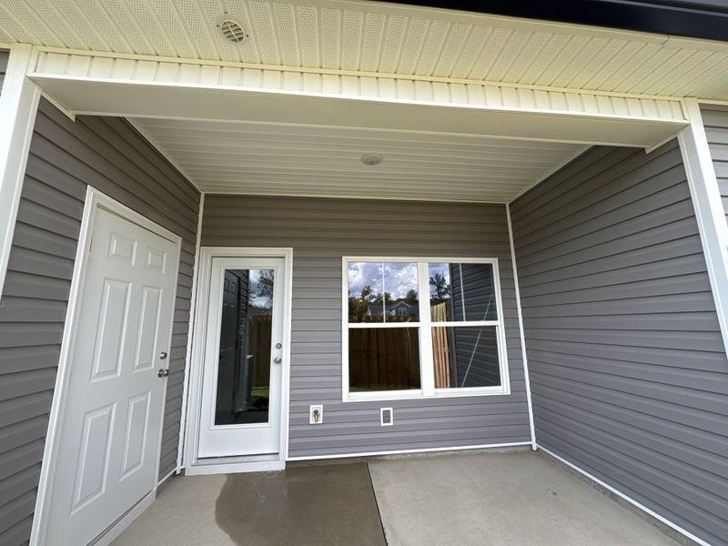 Exterior details and patio area of a home in Caroleton Townhomes, Grovetown (Image 4).