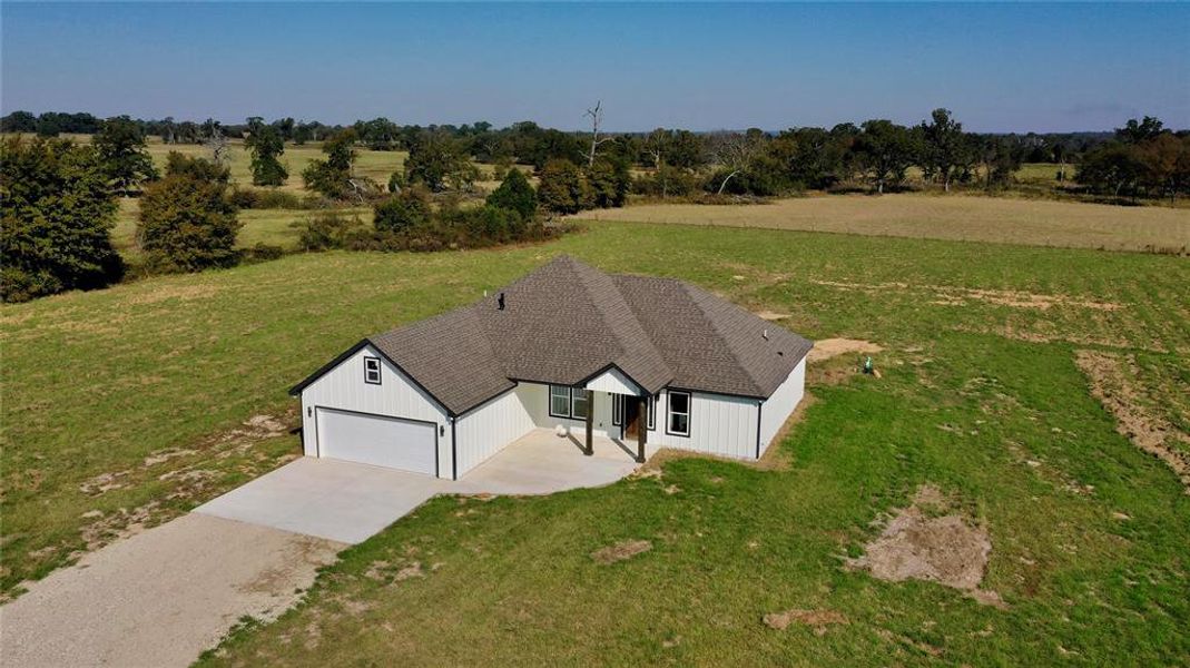 Front exterior of a new home in , Eustace, TX, highlighting curb appeal (Image 1). Front exterior of a new home in , Eustace, TX, highlighting curb appeal (Image 1).