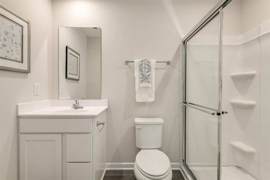 Representative furnished interior of a home built from the Tate by Ryan Homes in Middle Creek Village Coastal Cottages & Villas, Bolivia (Image 18).