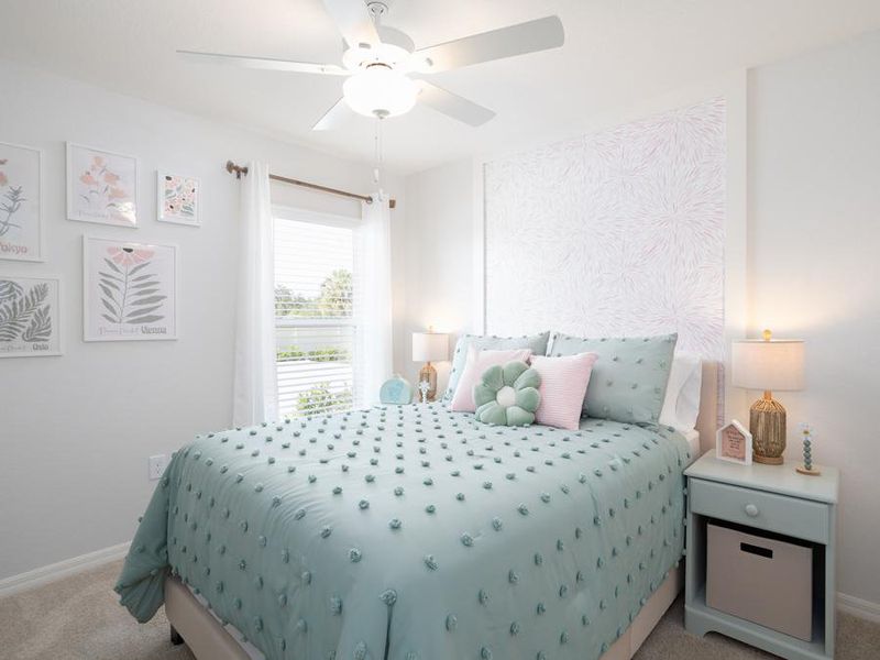 Spacious secondary bedrooms offer plenty of flexibility for any lifestyle- Peyton home plan by Highland Homes