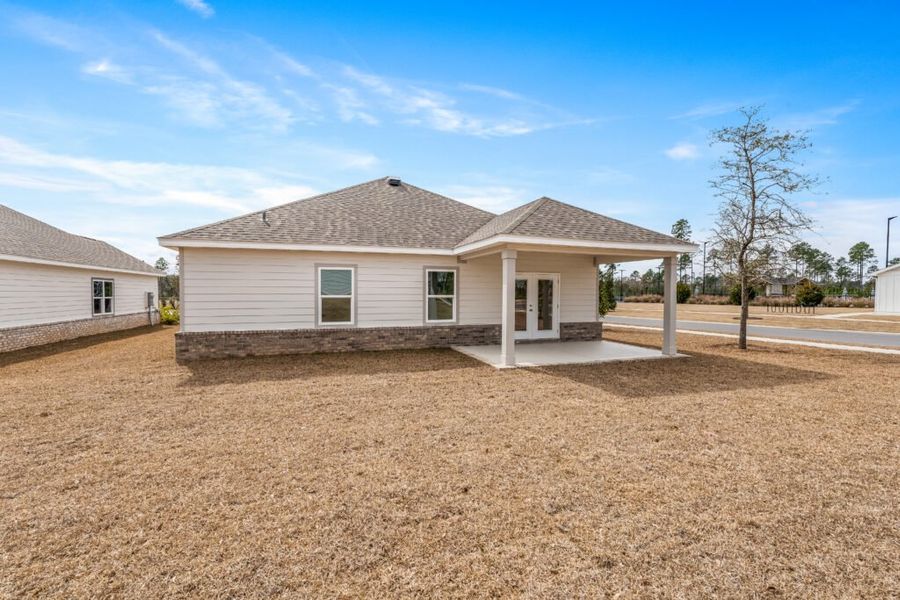 Exterior details and patio area of a home in Natureview, Freeport (Image 27).
