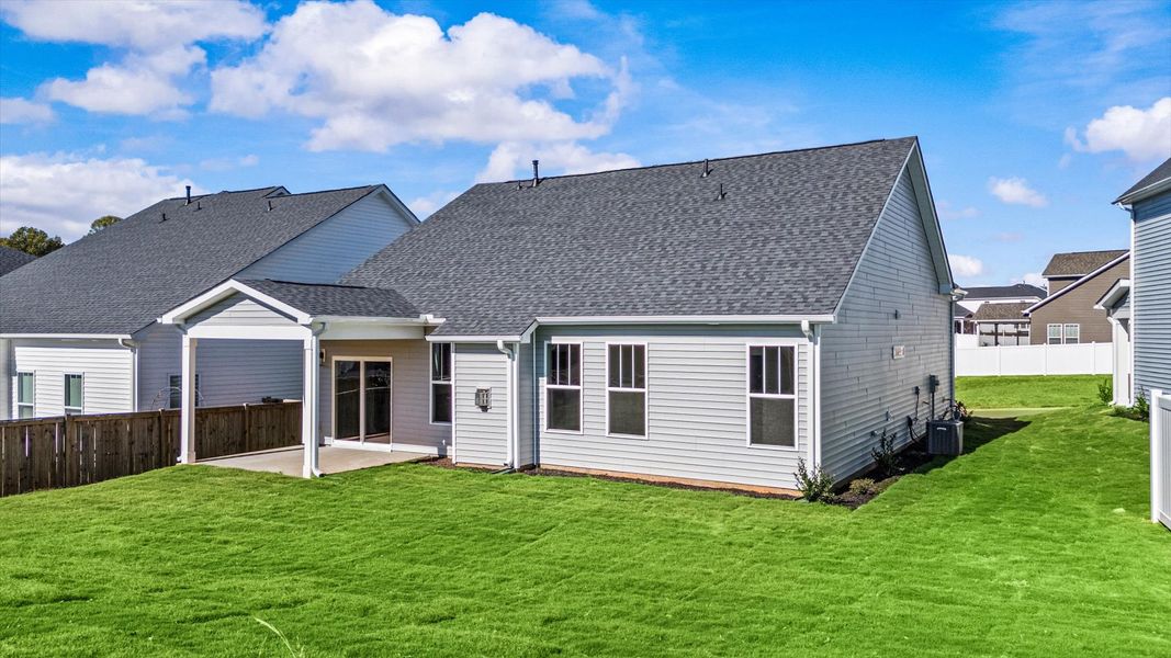Exclusive rear covered porch with accomplished detail and elevated outdoor living potential