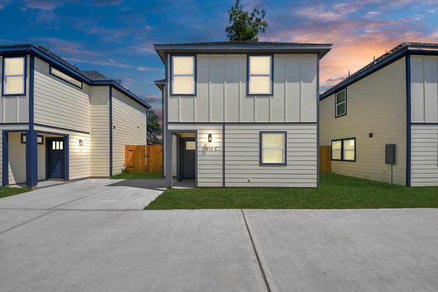Front exterior of a new home in , Houston, TX, highlighting curb appeal (Image 1).