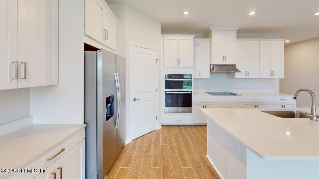 Furnished interior view inside a new home in Lakes at Bella Lago, Green Cove Springs (Image 3). Furnished interior view inside a new home in Lakes at Bella Lago, Green Cove Springs (Image 3).