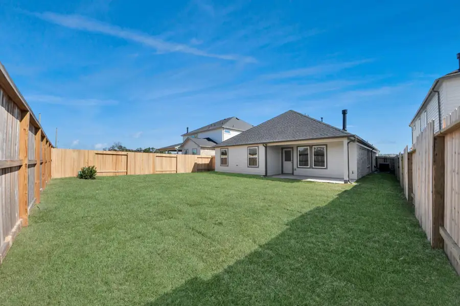 Experience outdoor living at its finest on this expansive covered patio, thoughtfully designed for BBQs and delightful outdoor dining. Experience outdoor living at its finest on this expansive covered patio, thoughtfully designed for BBQs and delightful outdoor dining.
