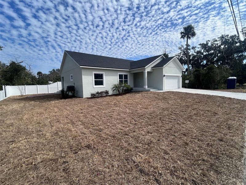 Exterior details and patio area of a home in , New Smyrna Beach (Image 3).