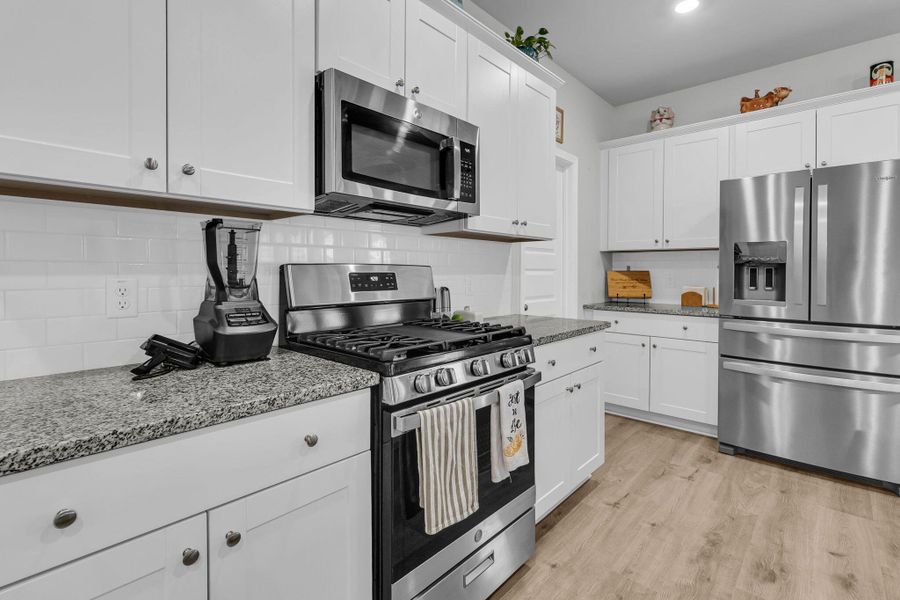 Furnished interior view inside a new home in Sweetgrass at Summers Corner, Summerville (Image 9).