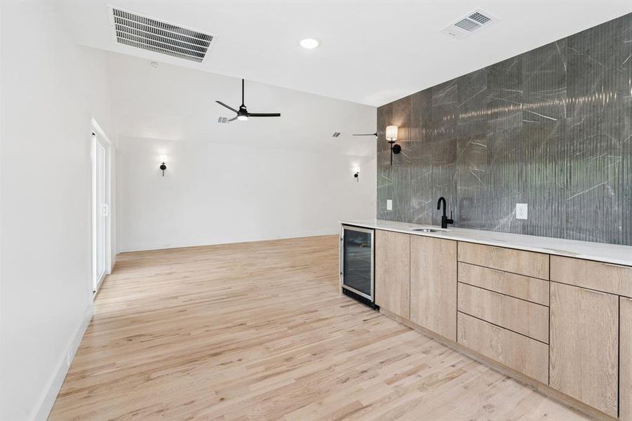 Wet bar on second floor great for entertaining.