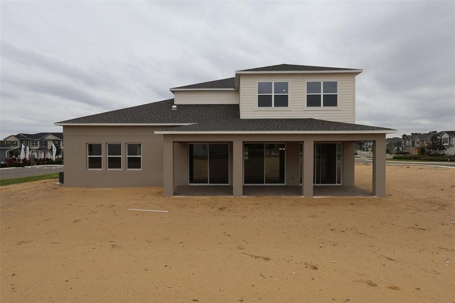 Exterior details and patio area of a home in Emerson Pointe, Apopka (Image 3). Exterior details and patio area of a home in Emerson Pointe, Apopka (Image 3).