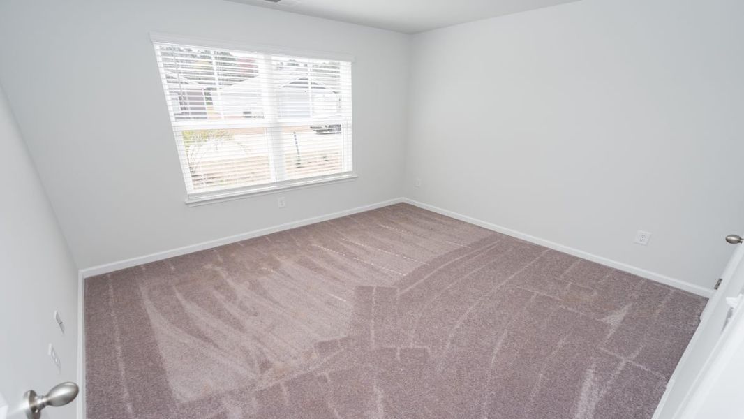 Representative unfurnished interior of a home built from the ARIA by D.R. Horton in Stanbury Creek, Supply (Image 10).