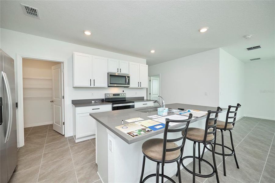 Furnished interior view inside a new home in Westgate at Avalon Park, Wesley Chapel (Image 13).