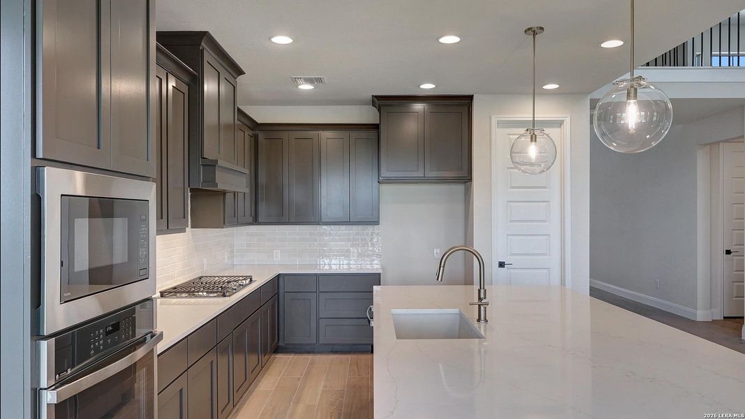 Furnished interior view inside a new home in Kallison Ranch, San Antonio (Image 11).