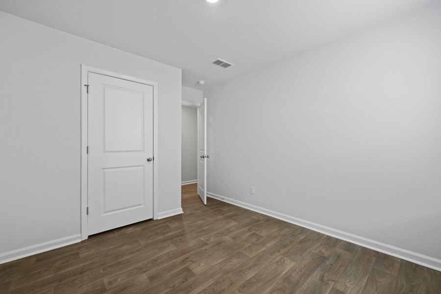 Spacious, unfurnished interior of a new home in Pine Hills at Cane Bay, Summerville (Image 12).